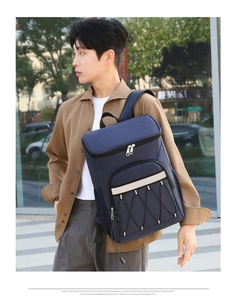 Detail of waterproof Oxford cloth picnic backpack with elastic bungee cords and mesh pockets