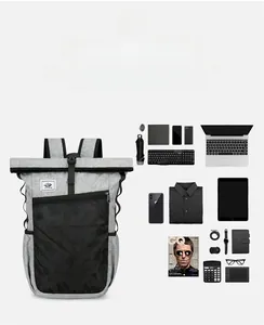 Detail showing foldable outdoor backpack storage capacity with laptop and accessories