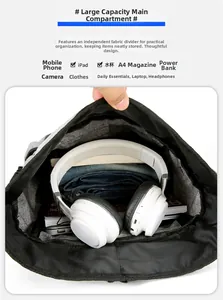 Internal view of the large capacity grey backpack showing organized storage compartments