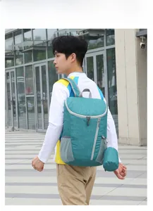 Waterproof lake green backpack with mesh side pocket and portable storage pouch