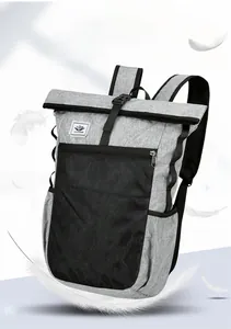 Lightweight grey and black waterproof travel backpack with mesh pocket and feather detail