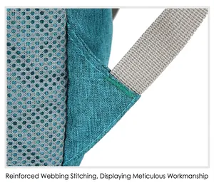 Detail of green reinforced stitching on teal travel backpack strap and breathable mesh