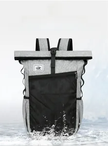 Waterproof grey roll-top outdoor backpack with black mesh pocket and buckle closure
