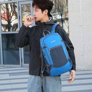 Foldable outdoor mountain backpack in blue and grey, lightweight waterproof hiking daypack