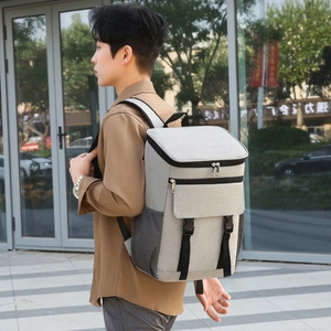 Insulated gray picnic backpack with U-shaped zipper and side mesh pockets for camping