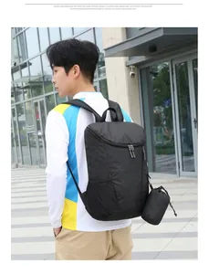 Waterproof black folding travel backpack with large capacity and side storage pouch