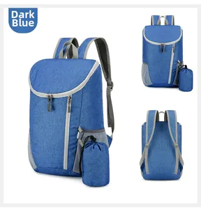 Detail view of foldable dark blue water-resistant backpack with drawstring storage bag