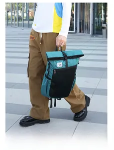 Detail of ultra-lightweight waterproof foldable outdoor backpack on a walking model