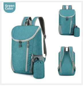 Macro detail of the foldable green backpack with water-resistant fabric and mesh straps
