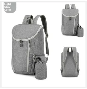Detail of light grey foldable waterproof backpack with breathable mesh straps and storage bag