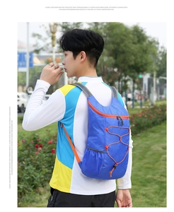 Side view of lightweight foldable blue backpack with orange zippers for outdoor hiking
