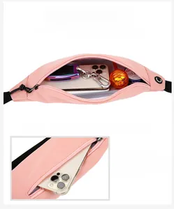 Sac banane de sport rose imperméable avec compartiment principal et poche zippée cachée