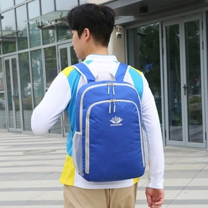 Lightweight foldable blue sport backpack with adjustable straps for outdoor hiking and travel