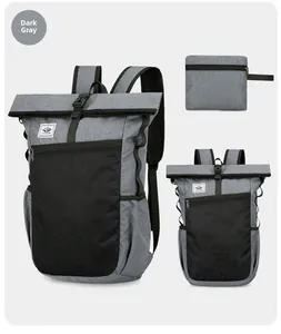 Detail view of the ultralight foldable outdoor backpack in dark grey with a roll-top design