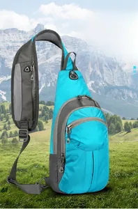 Outdoor hiking chest bag detail with earphone jack and breathable mesh strap on mountains