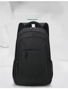 Macro view of black business backpack showing durable oxford fabric and mesh side pockets