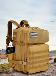 Tactical backpack in khaki nylon featuring MOLLE system and US flag patch in outdoor scene