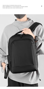 Business laptop backpack on a model showing water-resistant fabric and hidden front pocket