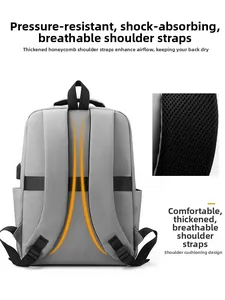Detail of breathable honeycomb mesh shoulder straps on grey business laptop backpack