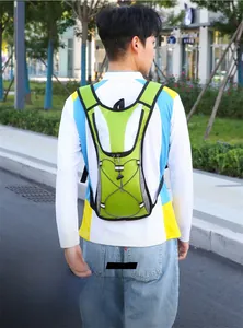 Rear view of a fluorescent green cycling backpack with bungee cord system for hiking