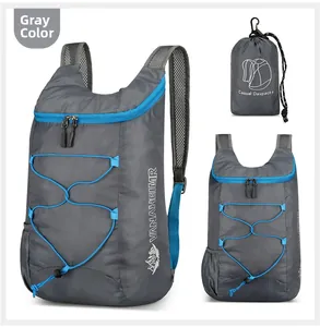 Foldable grey outdoor backpack detail with ripstop nylon texture and blue accents