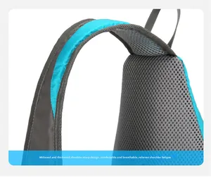 Detail of widened breathable mesh shoulder straps on blue hiking daypack for comfort