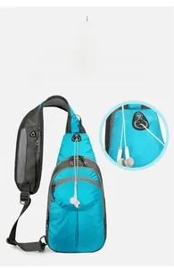 Crossbody hiking pack with dedicated earphone jack and multi-zippered nylon compartments