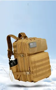 Close-up of khaki tactical backpack with MOLLE system and USA flag patch