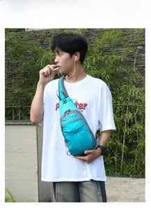 Outdoor blue hiking chest bag shown on model featuring tear-resistant nylon and gray trim