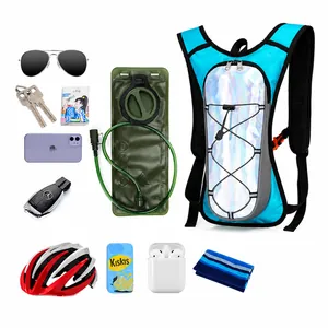 Outdoor hydration backpack showing spacious storage for helmet, water bag and gear