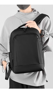 Detail view of water-resistant business laptop backpack with ergonomic padded shoulder straps