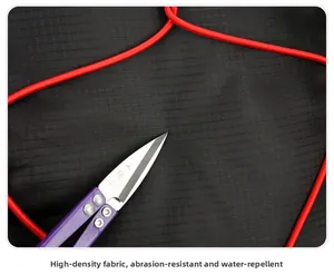 Close-up of high-density tear-resistant black fabric with water-repellent grid texture