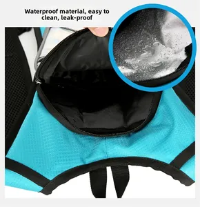 Detail of waterproof silver lining and internal zipper compartment on blue outdoor backpack