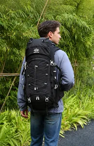Detail of a 60L outdoor hiking backpack in black showing Vanaheimr logo and straps