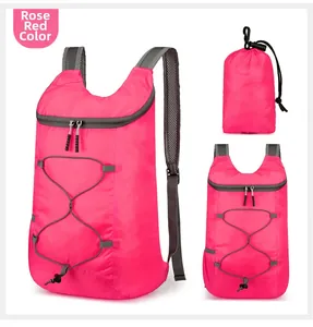 Rose red lightweight foldable backpack showing open view and compact storage bag