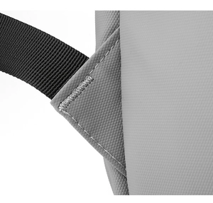 Macro shot of reinforced stitching on gray honeycomb textured fabric backpack straps
