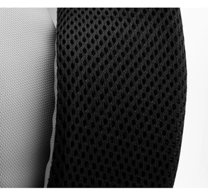 Detail of breathable honeycomb mesh and durable grey fabric on the laptop backpack