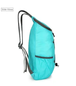 Side view of ultra-light teal ripstop nylon backpack showing adjustable mesh straps