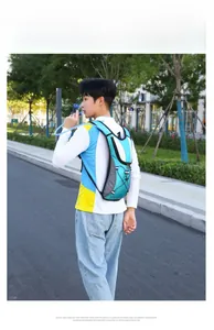 Close-up of lightweight water-resistant cycling backpack with elastic cords and tube outlet