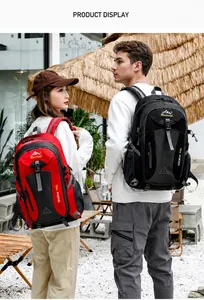 Detailed side view of 40L outdoor backpack with elastic mesh pockets and compression straps