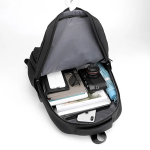 Large capacity black nylon laptop backpack with organized inner compartments for travel