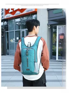 Detailed rear view of lightweight foldable hiking backpack in lake blue with mesh pockets