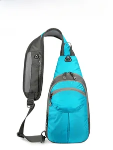 Front view of blue hiking daypack featuring multiple zipper pockets and breathable mesh back