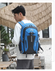 Blue 40L hiking backpack with thick padded straps and side mesh pocket for outdoor travel