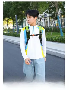 Outdoor sport top featuring breathable white fabric with blue and yellow panel accents