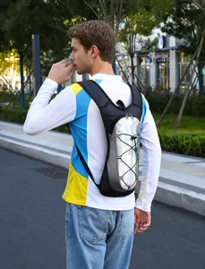 Outdoor hydration pack with silver holographic material and elastic cords on model