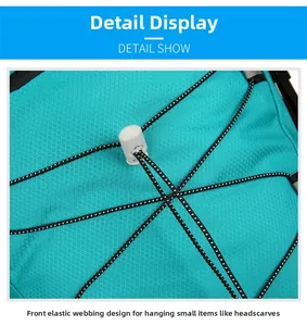 Detail view of the front elastic webbing system on a 60L blue outdoor hiking backpack