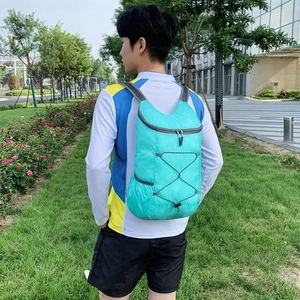 Ultralight portable foldable outdoor travel backpack for men and women in turquoise blue