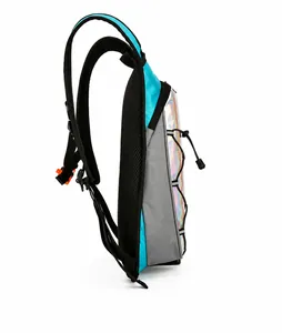 Detail view of the holographic front panel and breathable mesh back on the cycling backpack