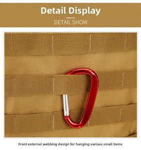 Detailed view of khaki tactical backpack featuring MOLLE webbing and red metal carabiner